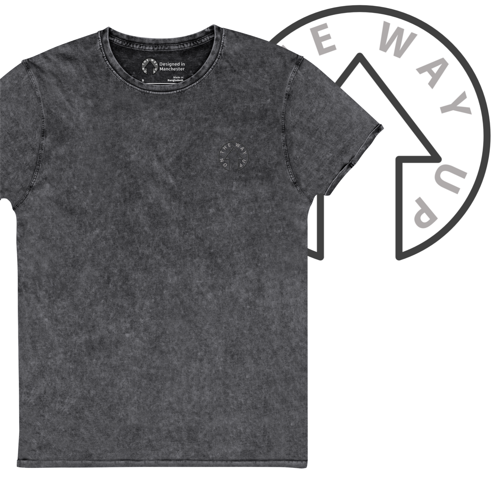 A Signature Denim Tee in charcoal gray, short-sleeved with a textured look displayed on a black background, featuring a small circular logo on the upper left chest area. This premium quality garment is ideal for everyday wear by On The Way Up Apparel.