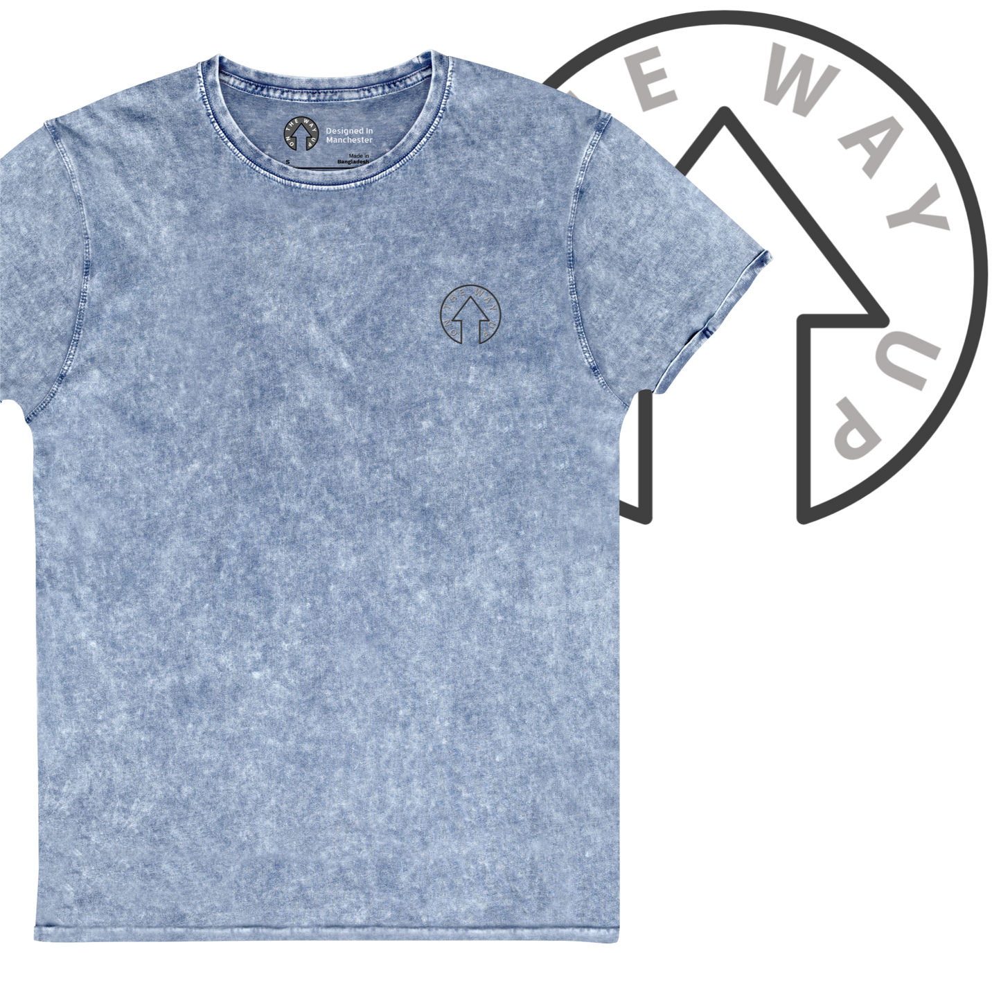 A blue acid-washed Signature Denim Tee of premium quality by On The Way Up Apparel, featuring a small circular logo on the left chest, displayed on a transparent background with a graphic element of an arrow encircling the bold text "ONE WAY.