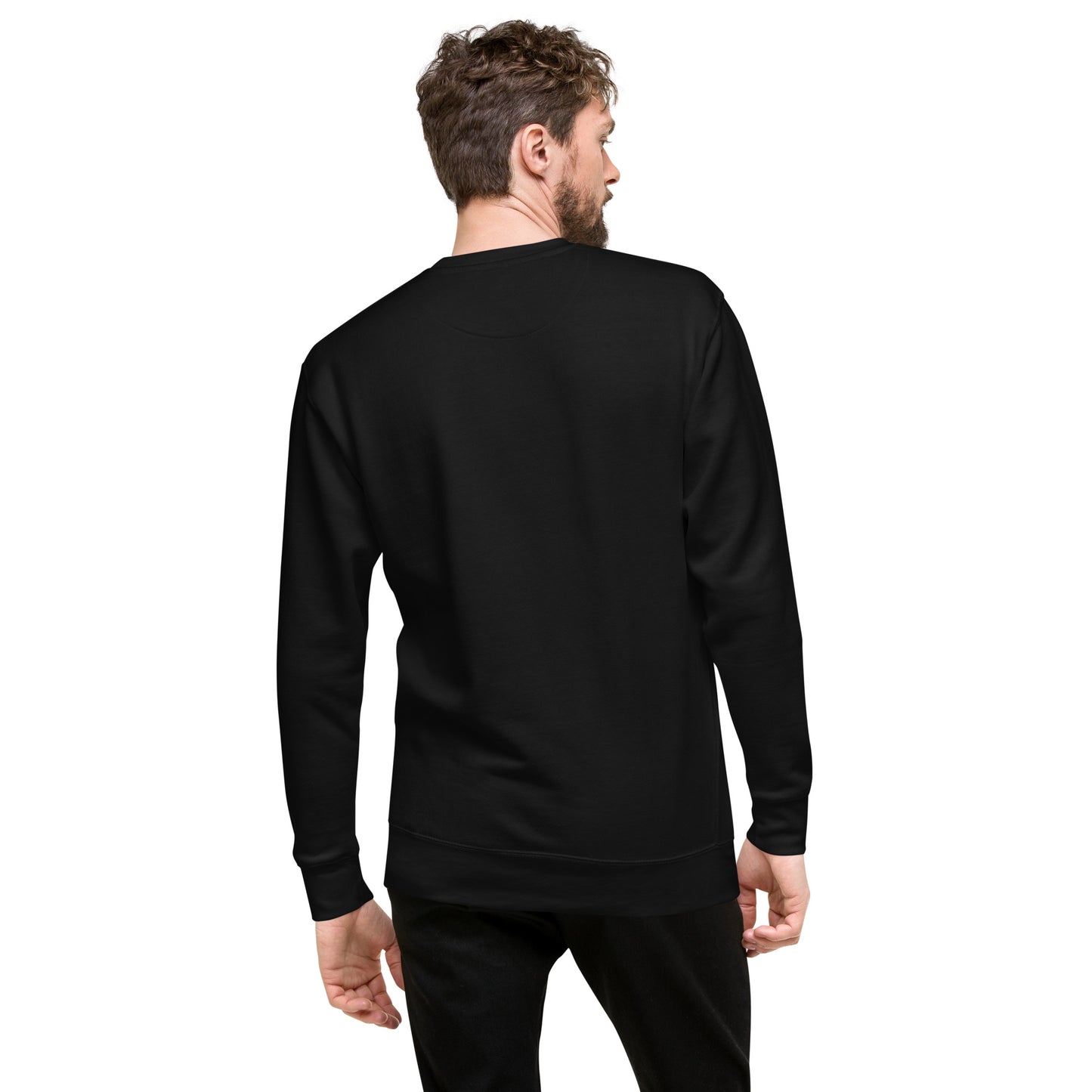 A man viewed from the back wearing an On The Way Up Apparel Signature Embroidered Logo Sweatshirt and black pants, standing against a plain white background.