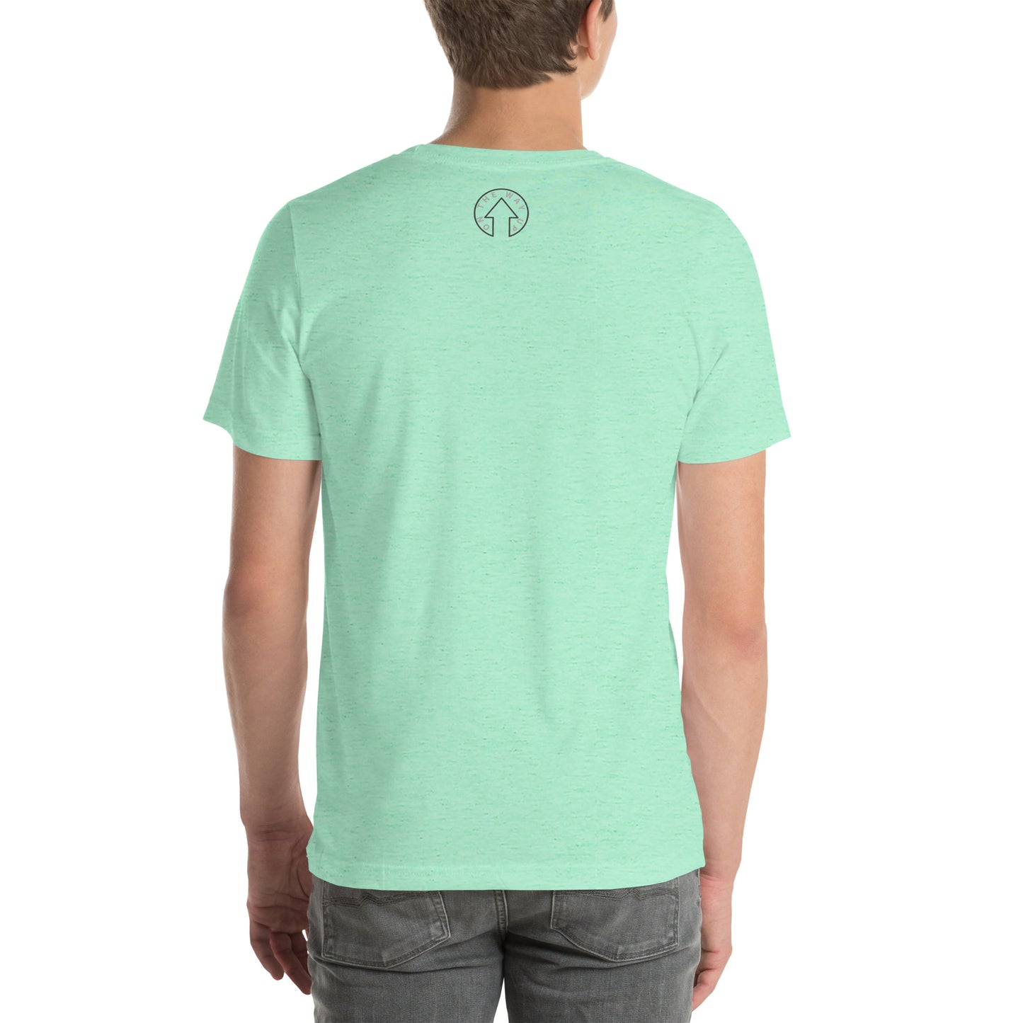 A man viewed from behind, wearing a premium quality On The Way Up Apparel light green t-shirt with a small logo at the nape and grey jeans, standing against a white background.