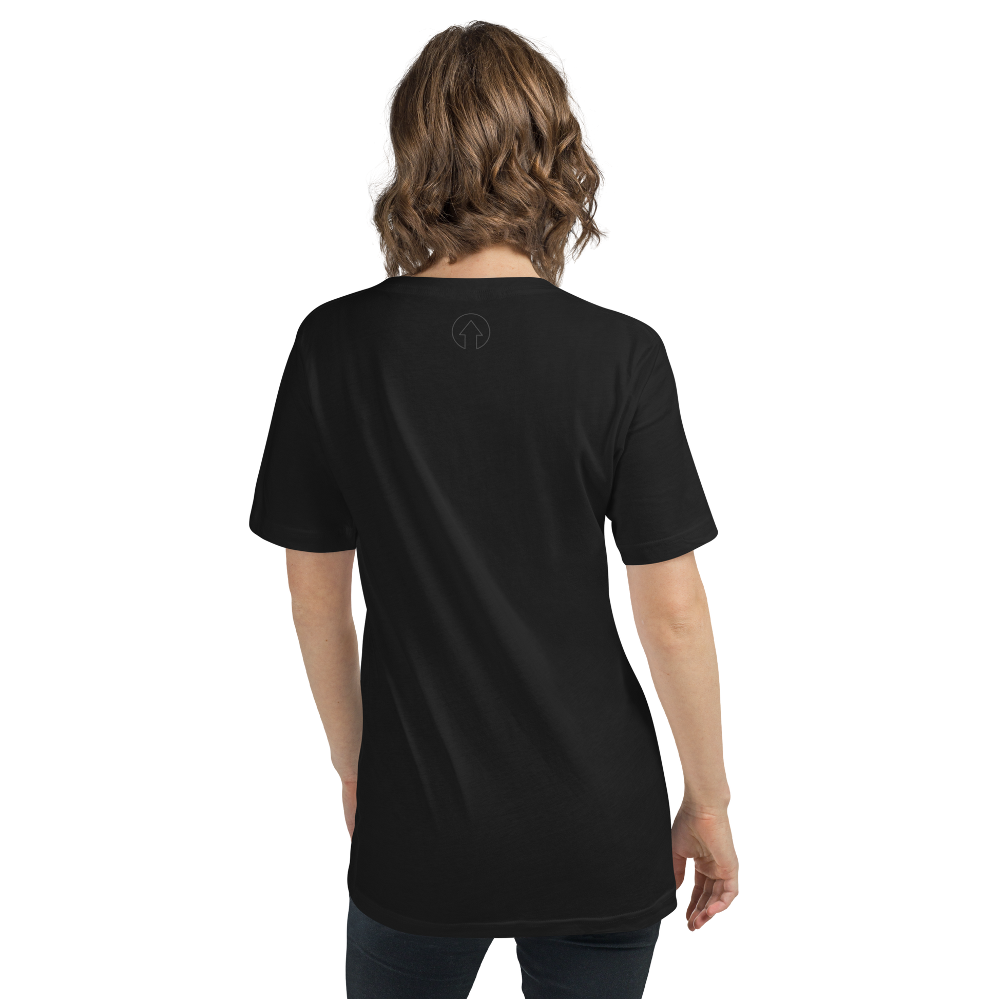 A woman with shoulder-length wavy hair, wearing a plain black On The Way Up Apparel Signature Short Sleeve V-Neck T-Shirt labeled "Premium Quality" with a small white logo on the back, is viewed from behind against a solid black background.